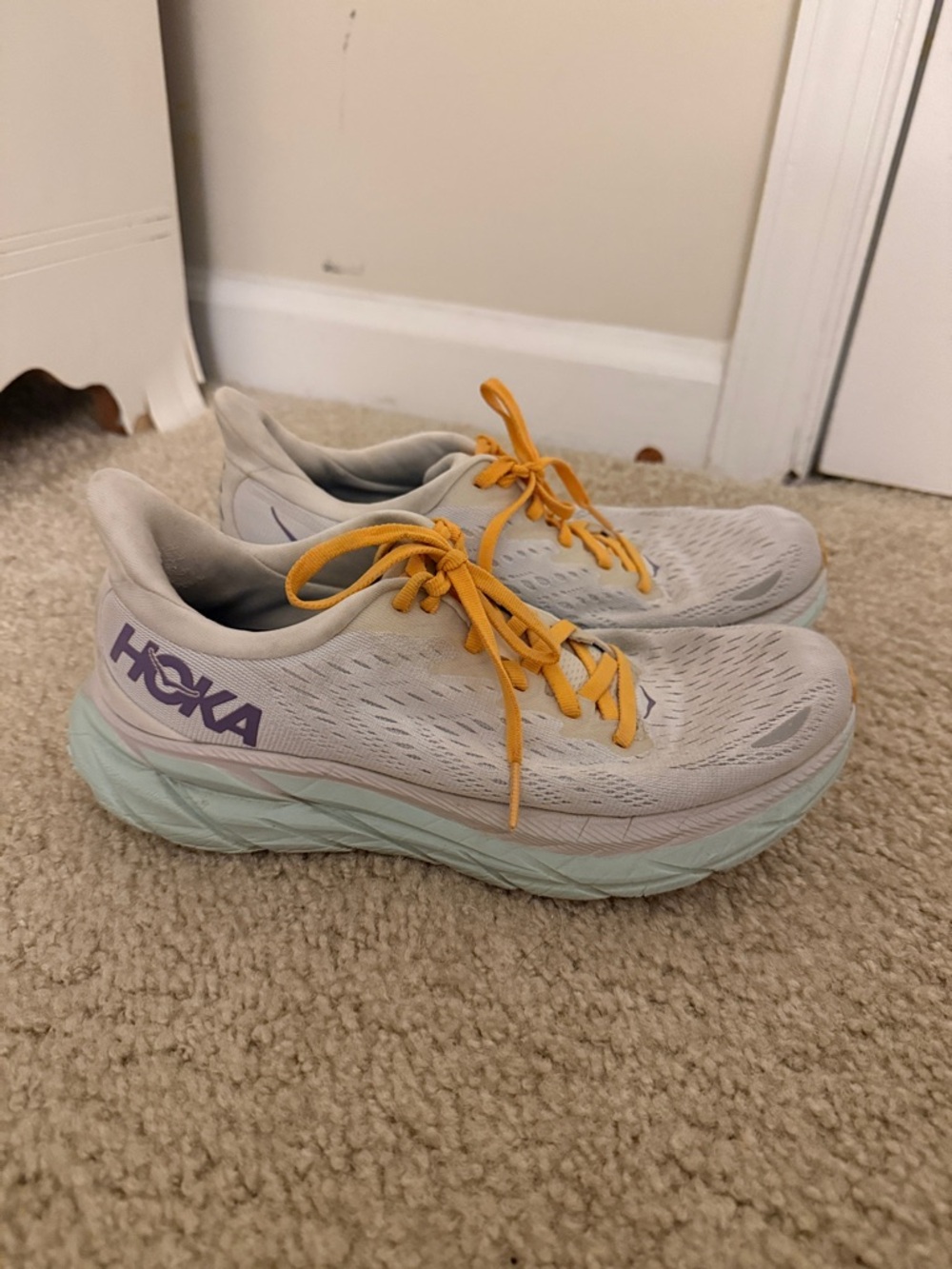 Hoka Women's Running Shoes in Light Gray with Mint Midsole and Yellow Laces
